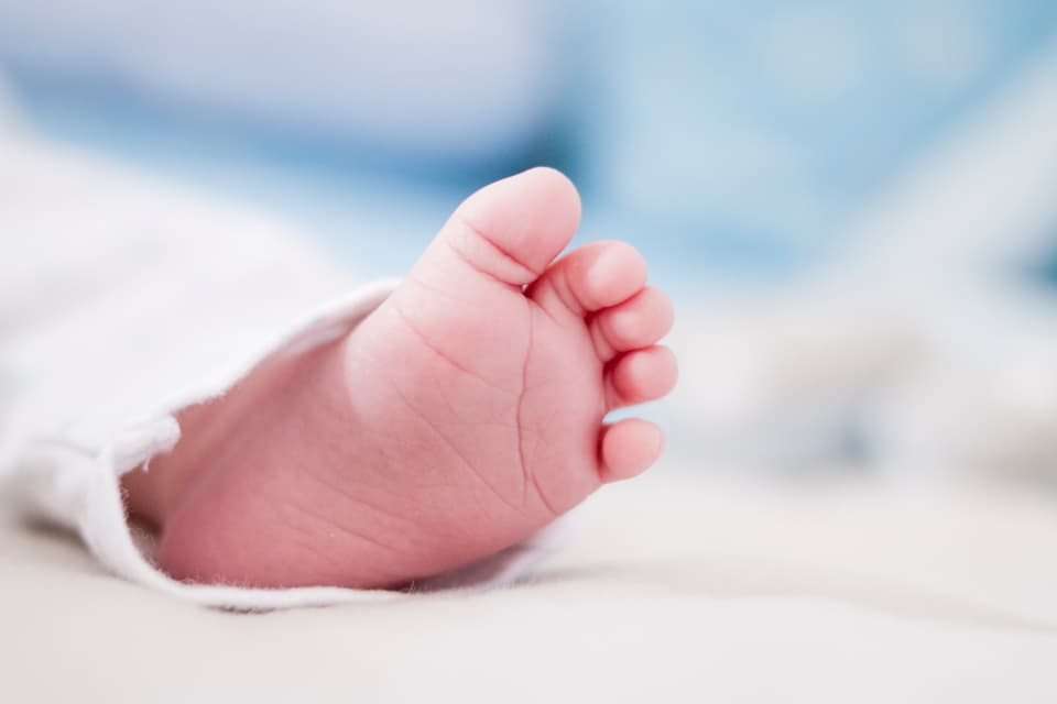 A newborn's tiny foot