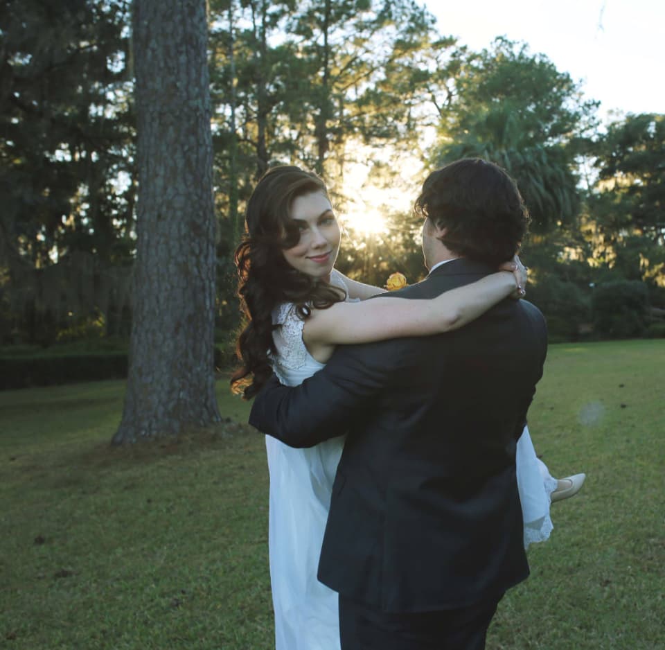 A couple embracing in the afternoon sun