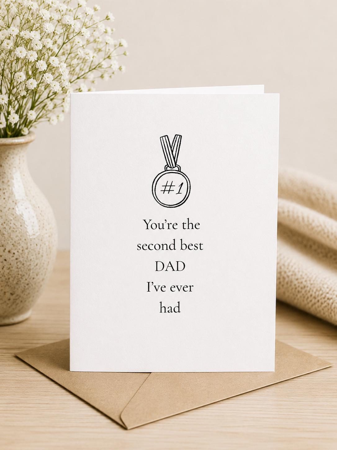 Funny Father's Day card with a number one medal reading you're the second best dad I've ever had
