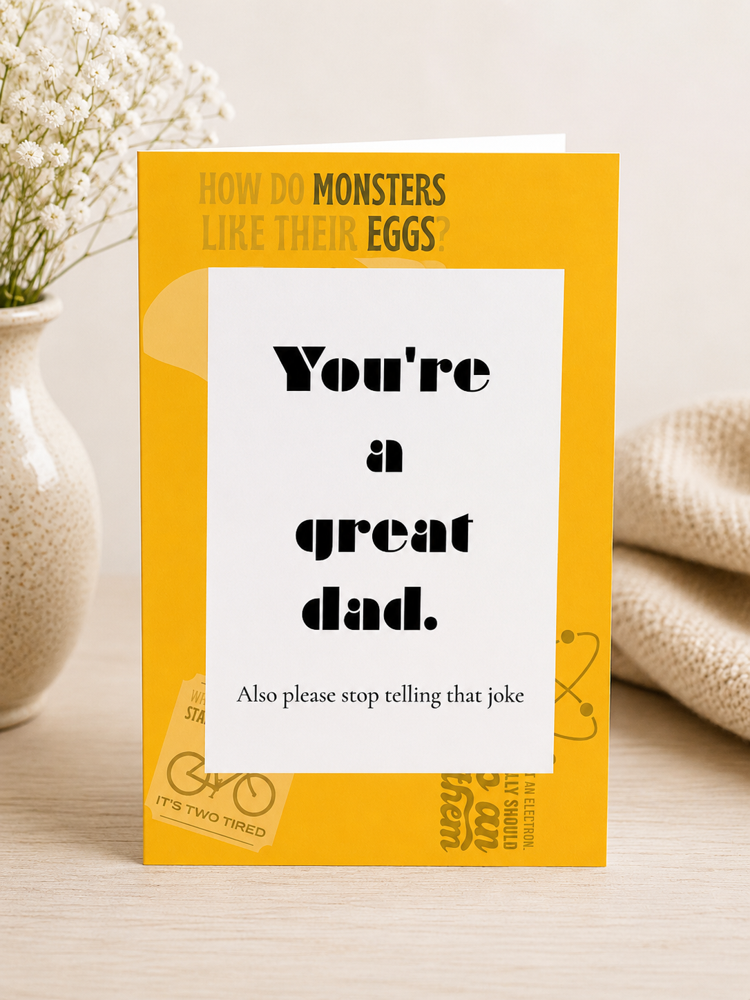Front: Funny Father's Day card reading you're a great dad also please stop telling that joke with dad jokes
