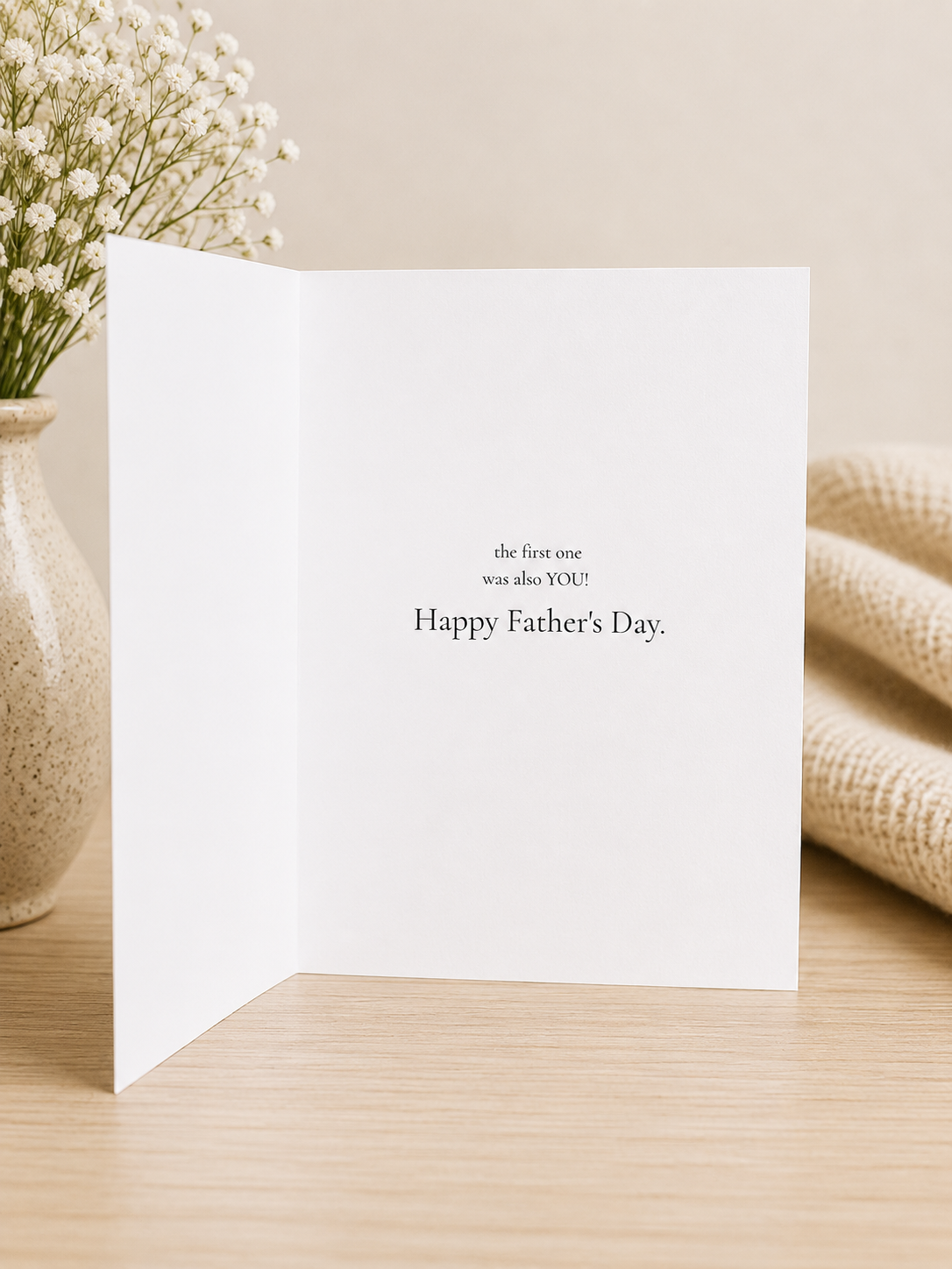 Inside of Father's Day card reading the first one was also you Happy Father's Day